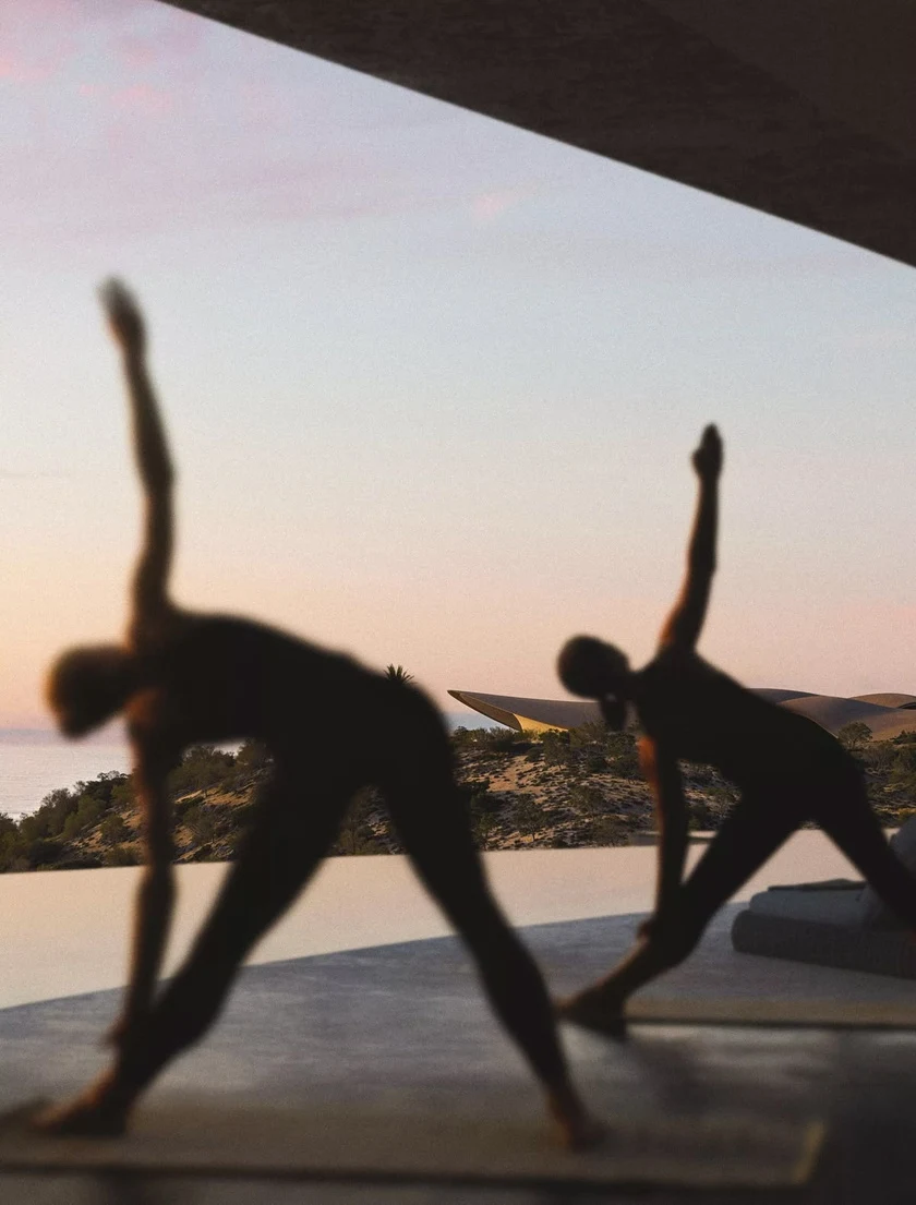 Outdoor stretching shown in the supplied Wellness Gateway brochure